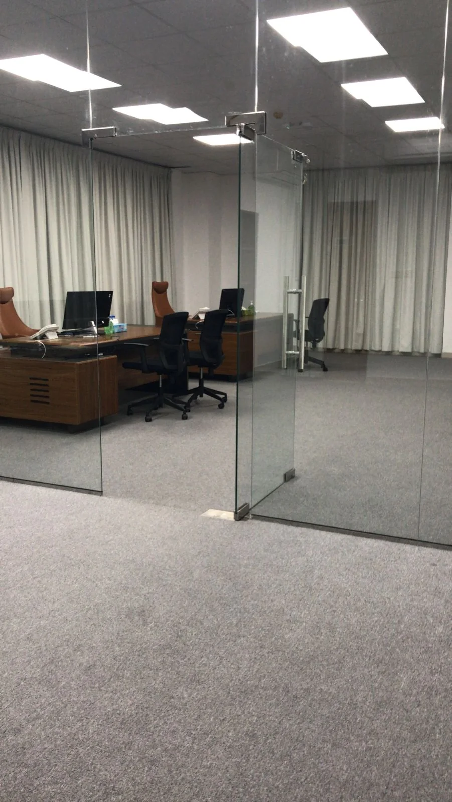 Glass-partitioned meeting room